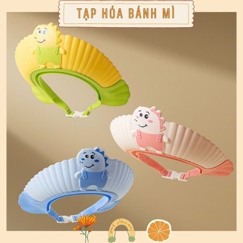 shopee-vn-11134207-820l.jpg Mũ gội đầu Nón tắm chắn nước họa tiết khủng long chibi cho bé - Image 1