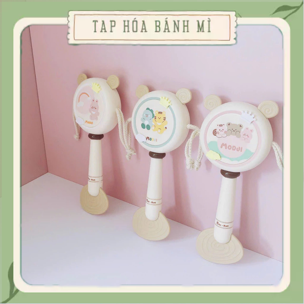 shopee-vn-11134211-7r98.jpg Trống lục lạc kiêm gặm nướu Modui x Bar Rot Đồ chơi silicon cao cấp họa tiết đáng yêu cho bé - Image 1